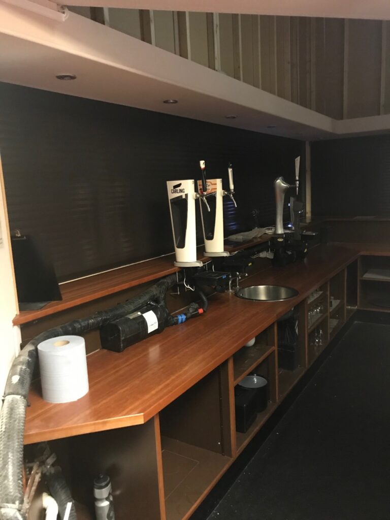 Roller Shutter Door on a bar demonstrating their importance for safety.