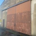 Old Shutter Door with Liability Risks.