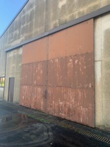 Old Shutter Door with Liability Risks.